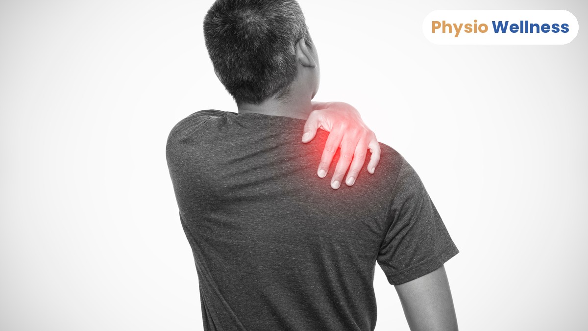 Man holding his stiff, painful shoulder, a common sign of a frozen shoulder