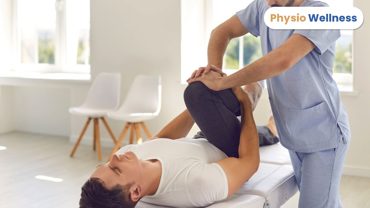 Physiotherapist giving hands-on treatment to a car accident patient at PhysioWell in Etobicoke