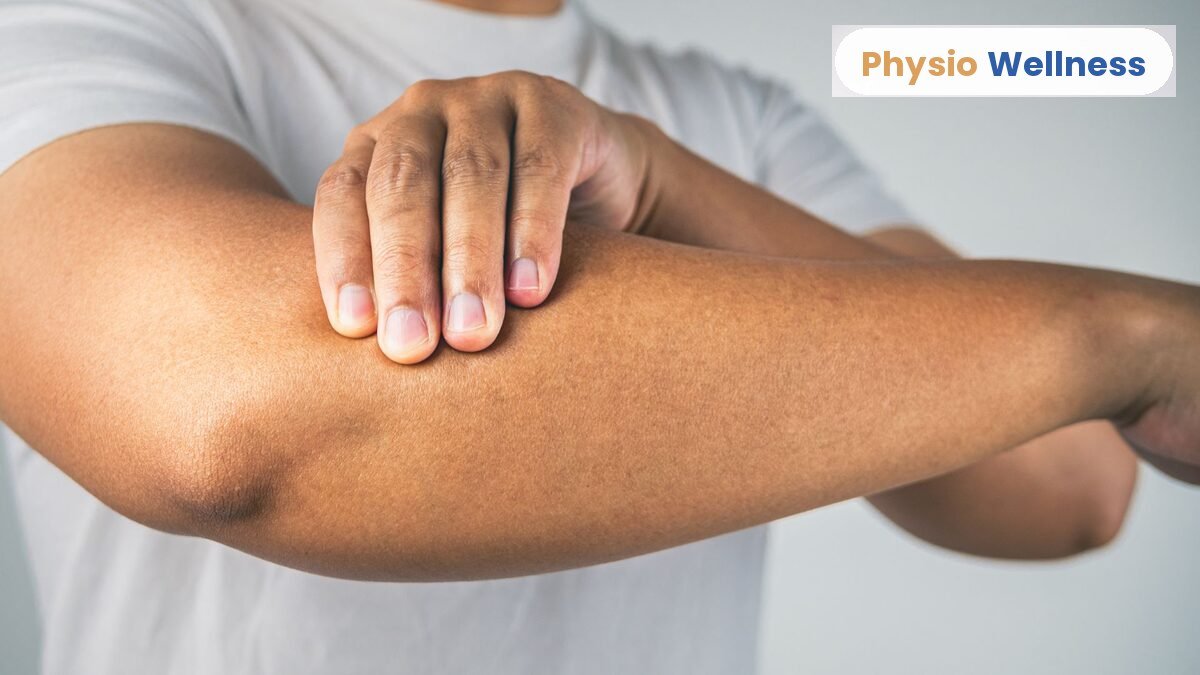 Physiotherapist assessing a patient’s elbow and forearm, Physio Wellness Etobicoke