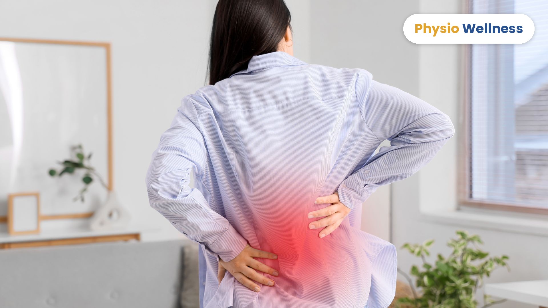 Woman in Etobicoke holding her lower back in pain at home